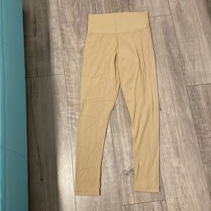 TNAButter full length, high rise legging. Like new. Size M. Tan colour.